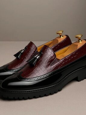 Women’s Burgundy Croc-Embossed Tassel Loafers with Black Trim. Never been worn!
